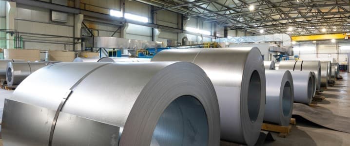 rolled steel coils in a warehouse