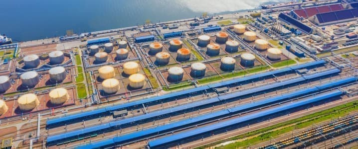 IEA Trims Oil Glut Forecast as Supply Surge Halts