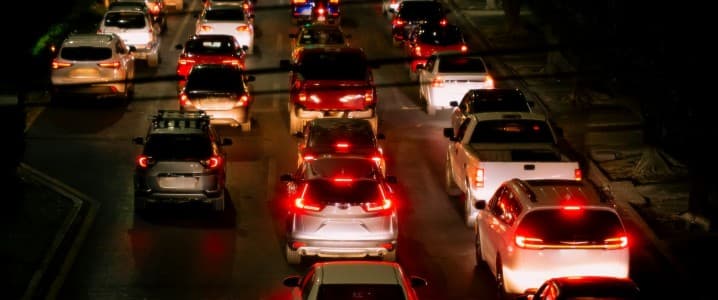 cars stuck in traffic at night
